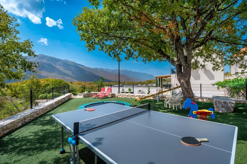 Table tennis in the outdoor play area