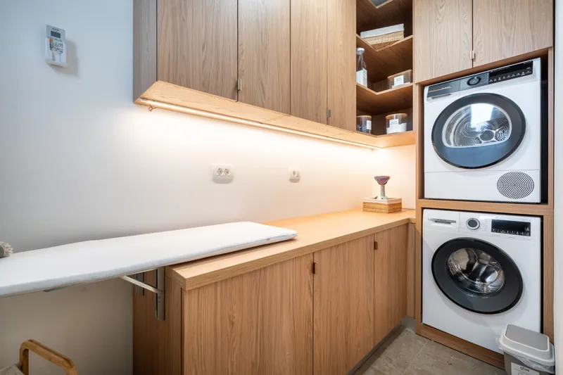 Laundry room with washing machine and dryer