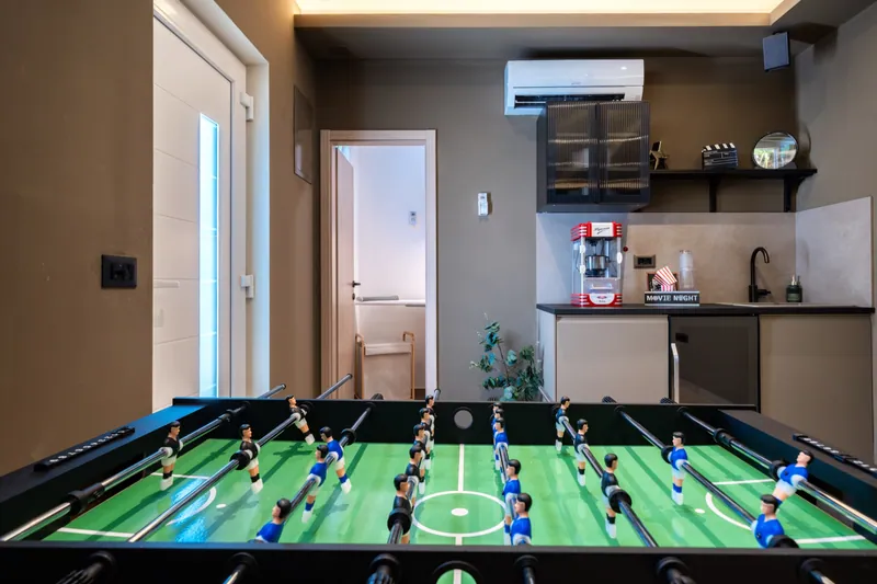 Table football and kitchenette in the game room